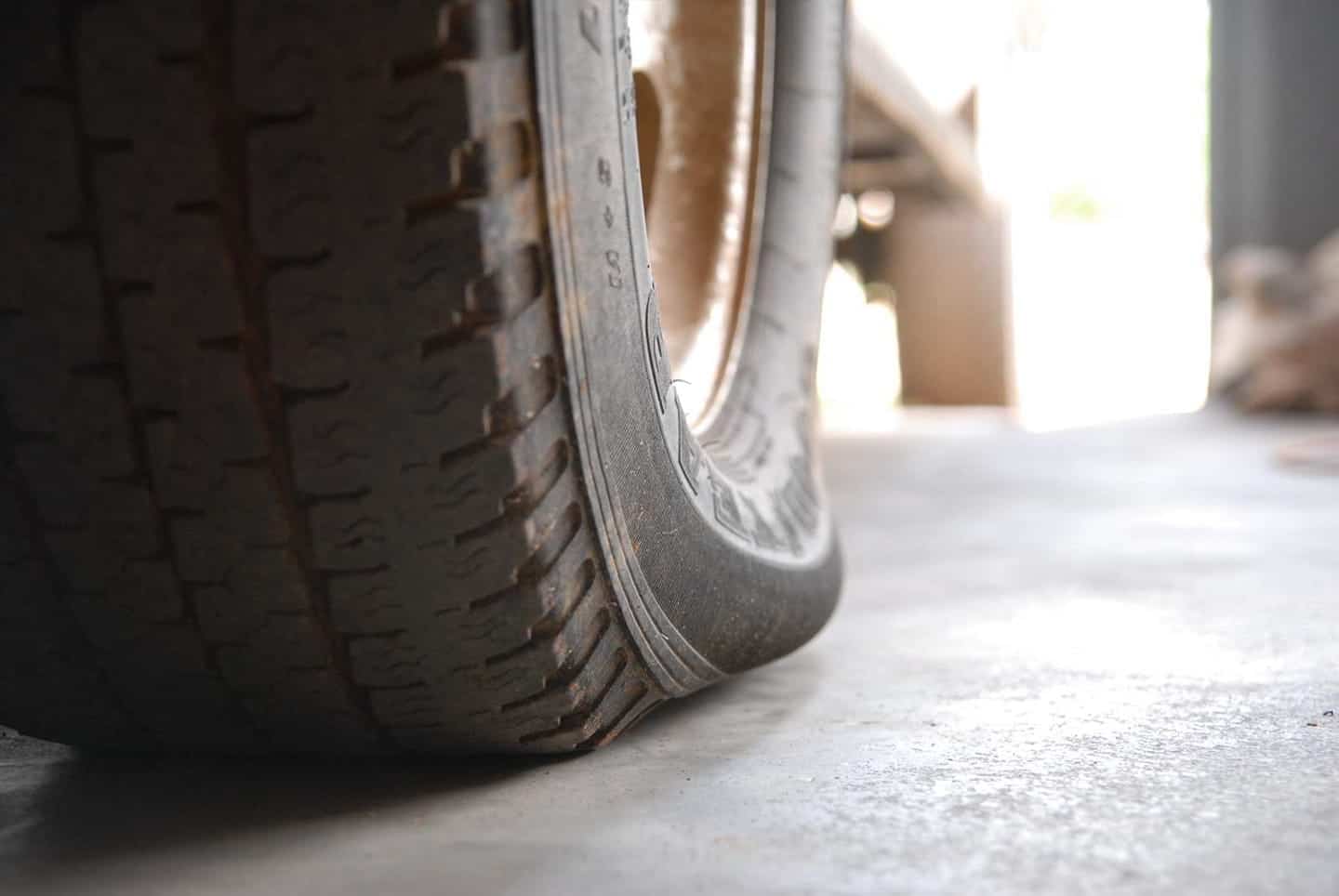 underinflated car tire