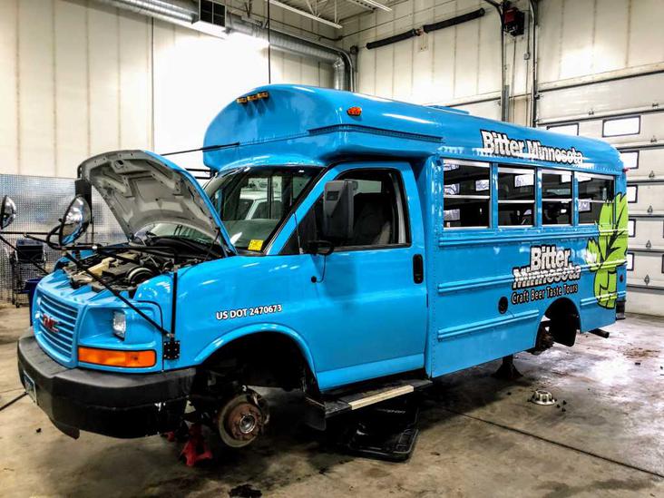Commercial bus being serviced