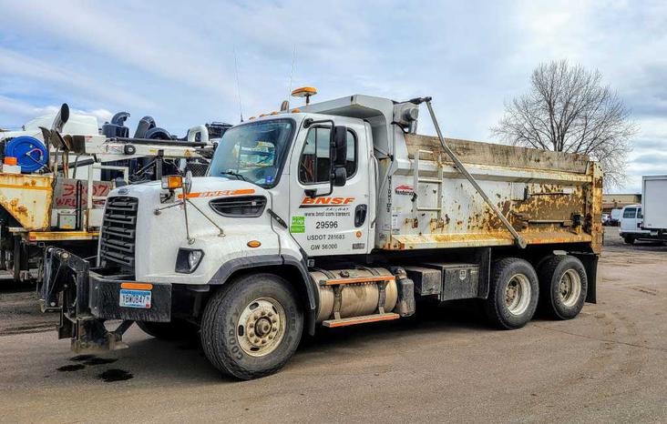 Truck with rust in shop for repair
