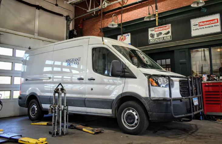 Transport van in body shop