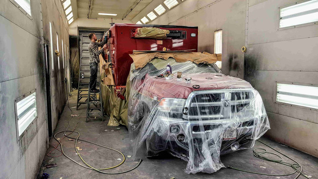Commercial truck in body shop being repaired