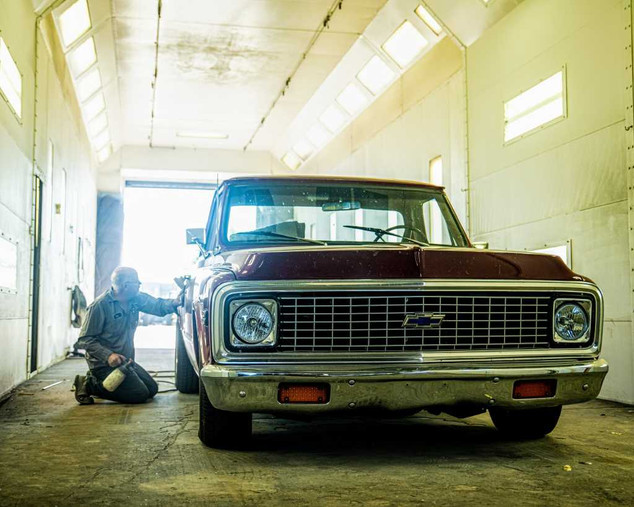 Auto vehicle being repaired in body shop