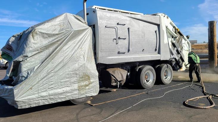 Automotive sandblasting of truck