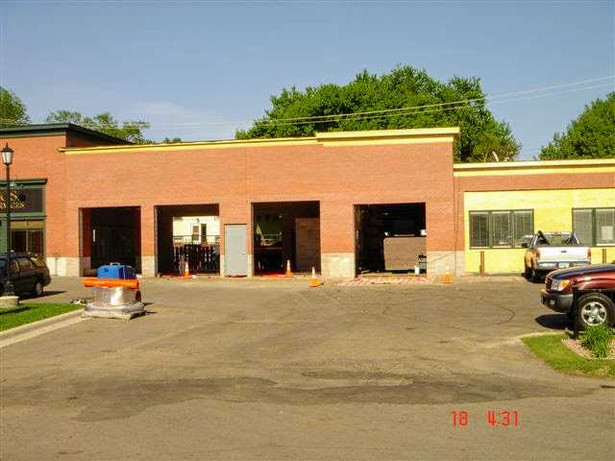 The addition that connected the auto shop and convenience store is coming to a close