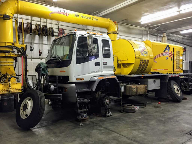 Burlingon Northern Railroad's Air Forced One in for repairs - it is designed to blow snow off of railroad tracks