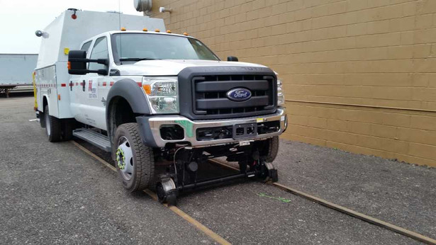 In ground raills allow for improved services on railroad utility vehicles