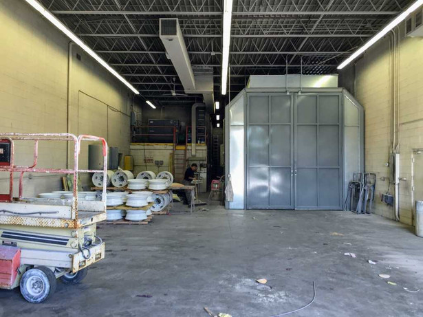 Brian Bona cleaning up the new shop