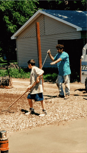 Brian and his son Matthew preparing the ground for the new fence